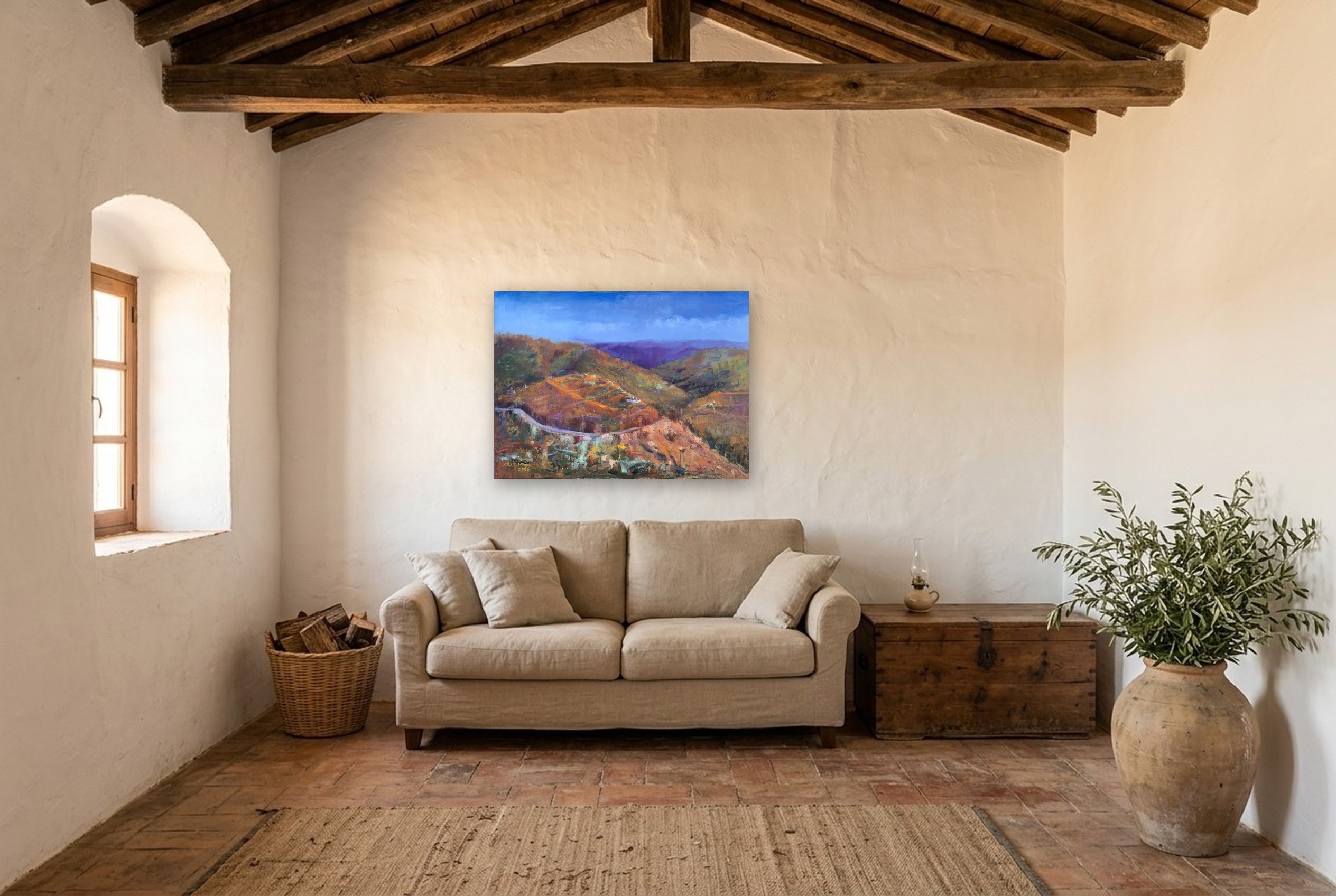 «Montes de Málaga», cuadro original de Alicia Prado, colgado en el salón de un cortijo andaluz