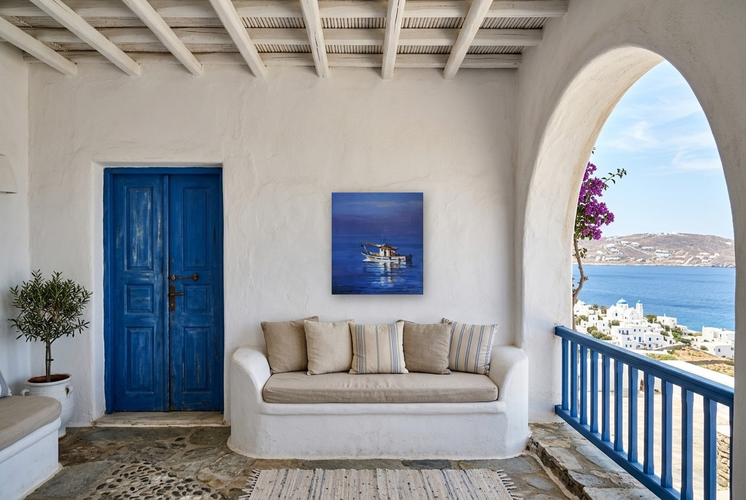 «La Traíña», cuadro original de Alicia Prado, colgado en un porche estilo Mykonos frente al mar