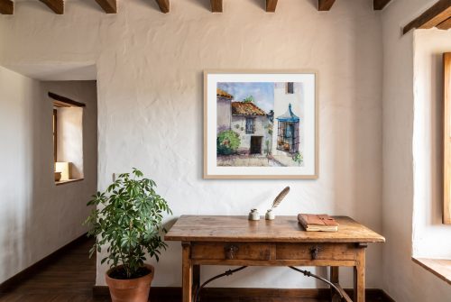 «Castellar», cuadro original de Alicia Prado, colgado en estudio rústico en Castellar de la Frontera