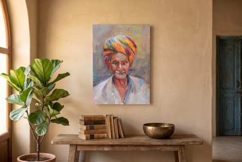 «Indio con Turbante», cuadro original de Alicia Prado, colgado en rincón de lectura en un hotel de diseño colonial