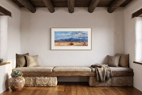 «Paisaje con cielo azul», cuadro original de Alicia Prado, colgado en salón rústico en un cortijo de montaña